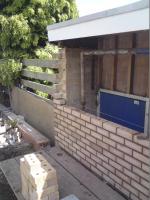 Facing brickwork in process of being constructed.